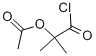 Propanoyl chloride,2-(acetyloxy)-2-methyl-
